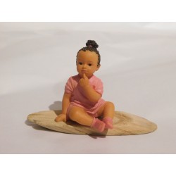 Figurine petite fille assise