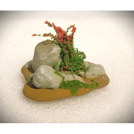 Décor de pierres et plantes fleuries